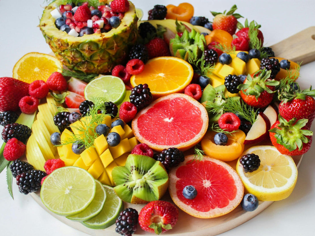 An abundant mix of fresh summer berries — the playful, vibrant ingredient driving one of 2026's biggest fragrance trends