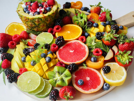 An abundant mix of fresh summer berries — the playful, vibrant ingredient driving one of 2026's biggest fragrance trends