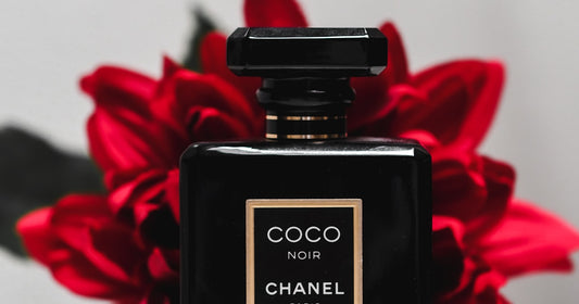 Elegant perfume bottle on a dresser with soft lighting