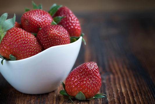 Fresh ripe strawberries — the juicy, vibrant note driving one of 2026's biggest fragrance trends